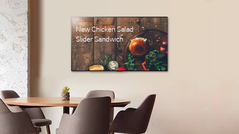 wall tv display showing a food menu