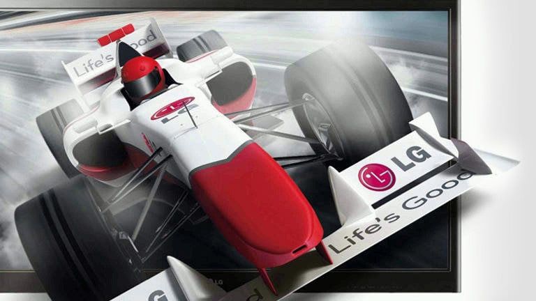 View of an LG TV screen with the image of an F1 car bursting from the screen.