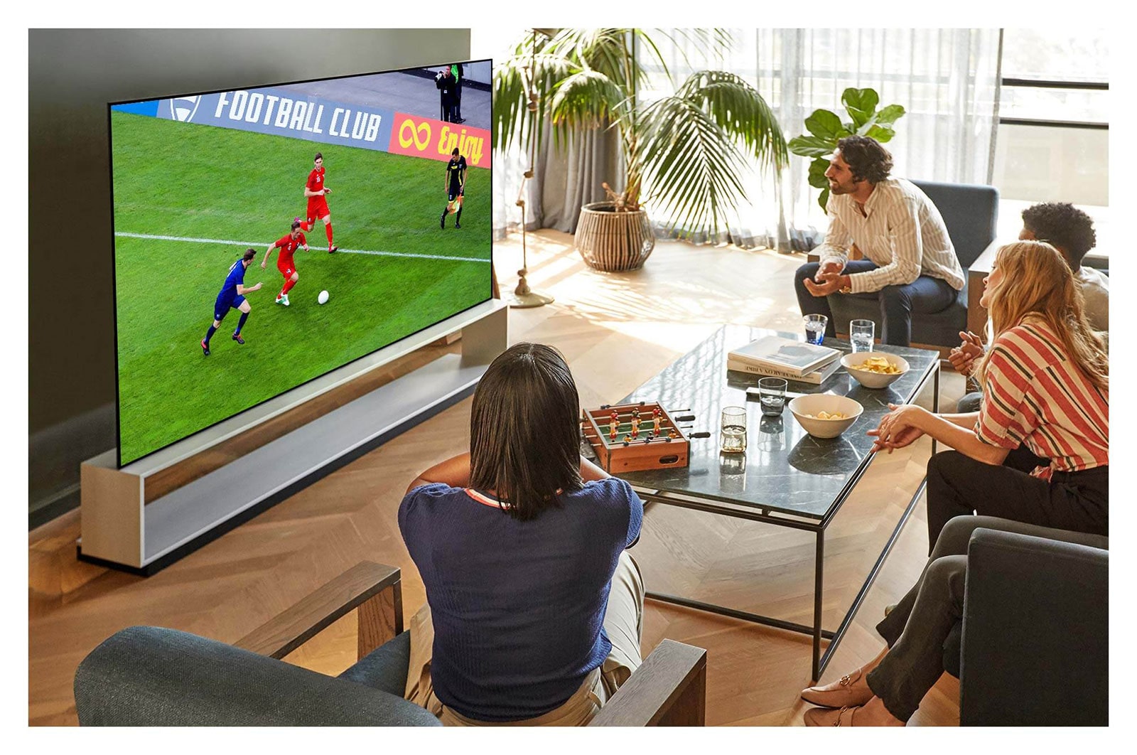 LG SIGNATURE ZX 88 inch Class 8K Smart OLED TV w/AI ThinQ® (87.6'' Diag), People watching sports game on TV in the living room, OLED88ZXPUA