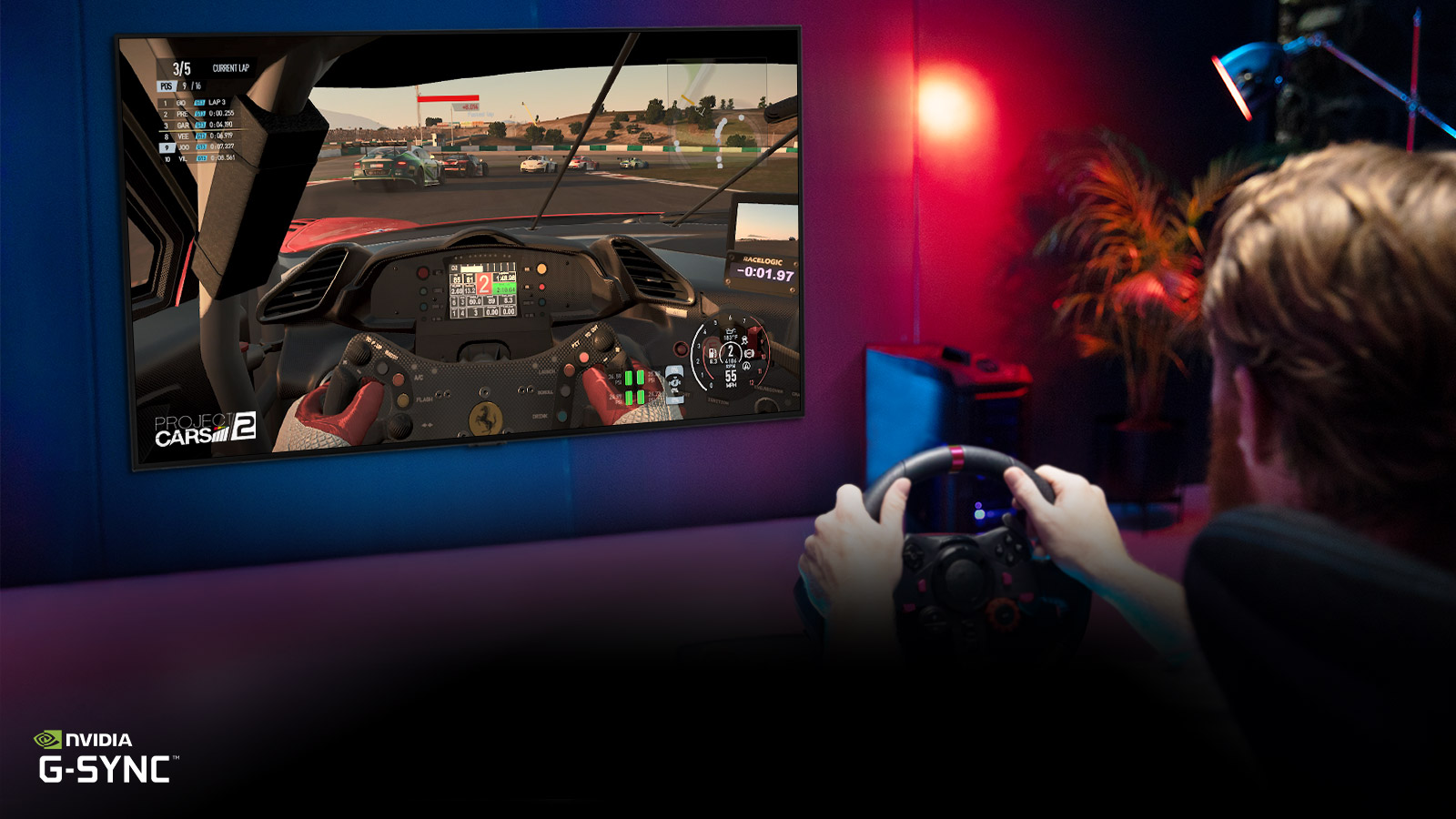 Man sitting on a racer gaming chair, holding a racing wheel while playing a racing game on a TV screen