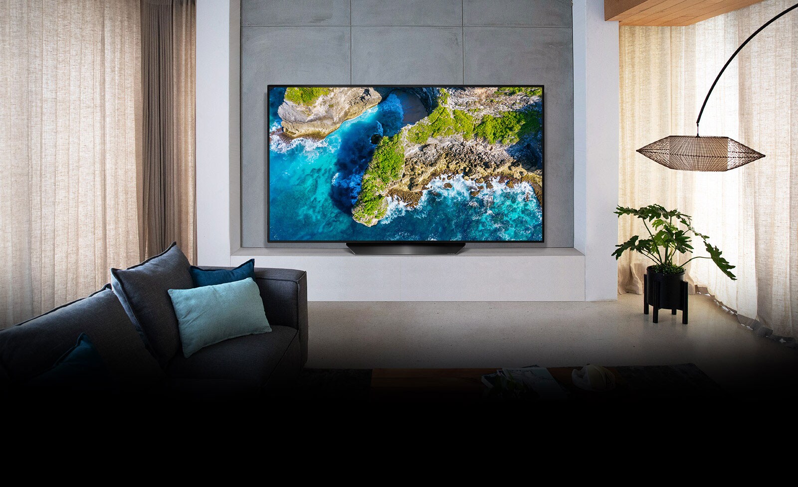 TV showing an aerial view of nature in a luxurious house setting