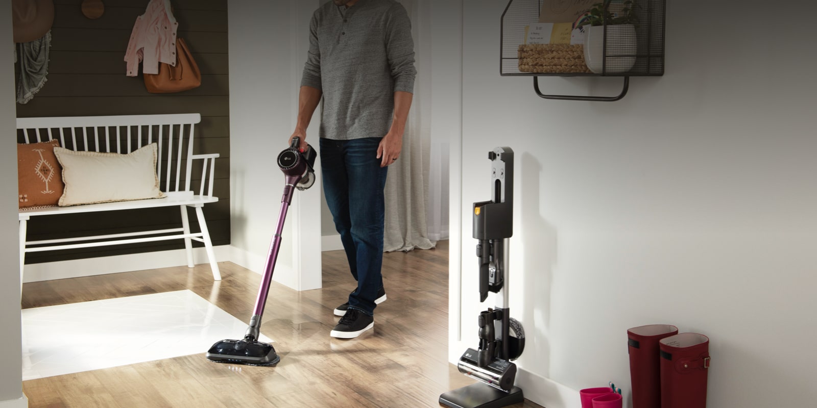Image of vacuum mop with portable charging stand in home setting