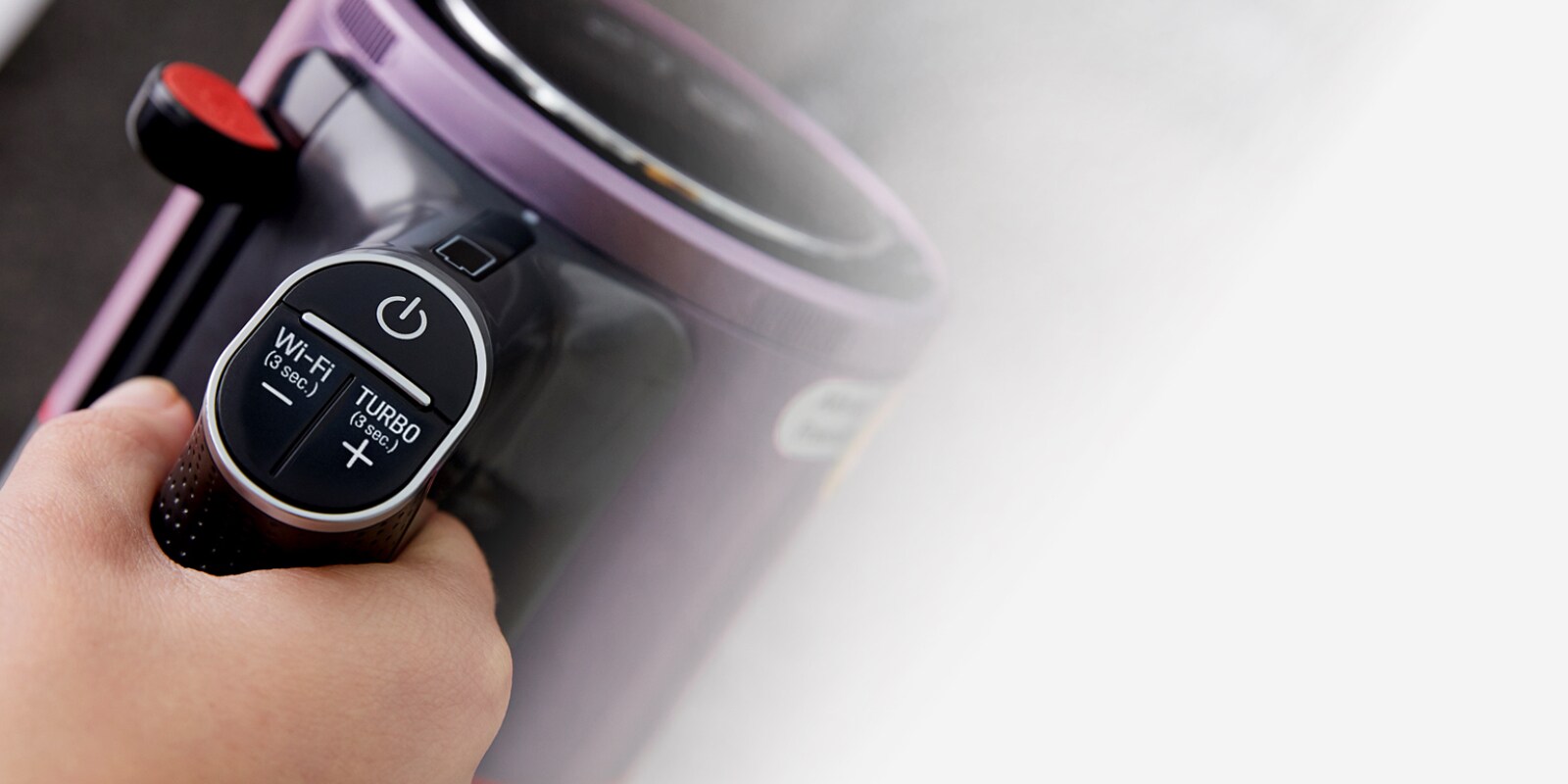 Close up of power button on LG CordZero™ A9 Stick Vacuum for Turbo mode and Wi-Fi