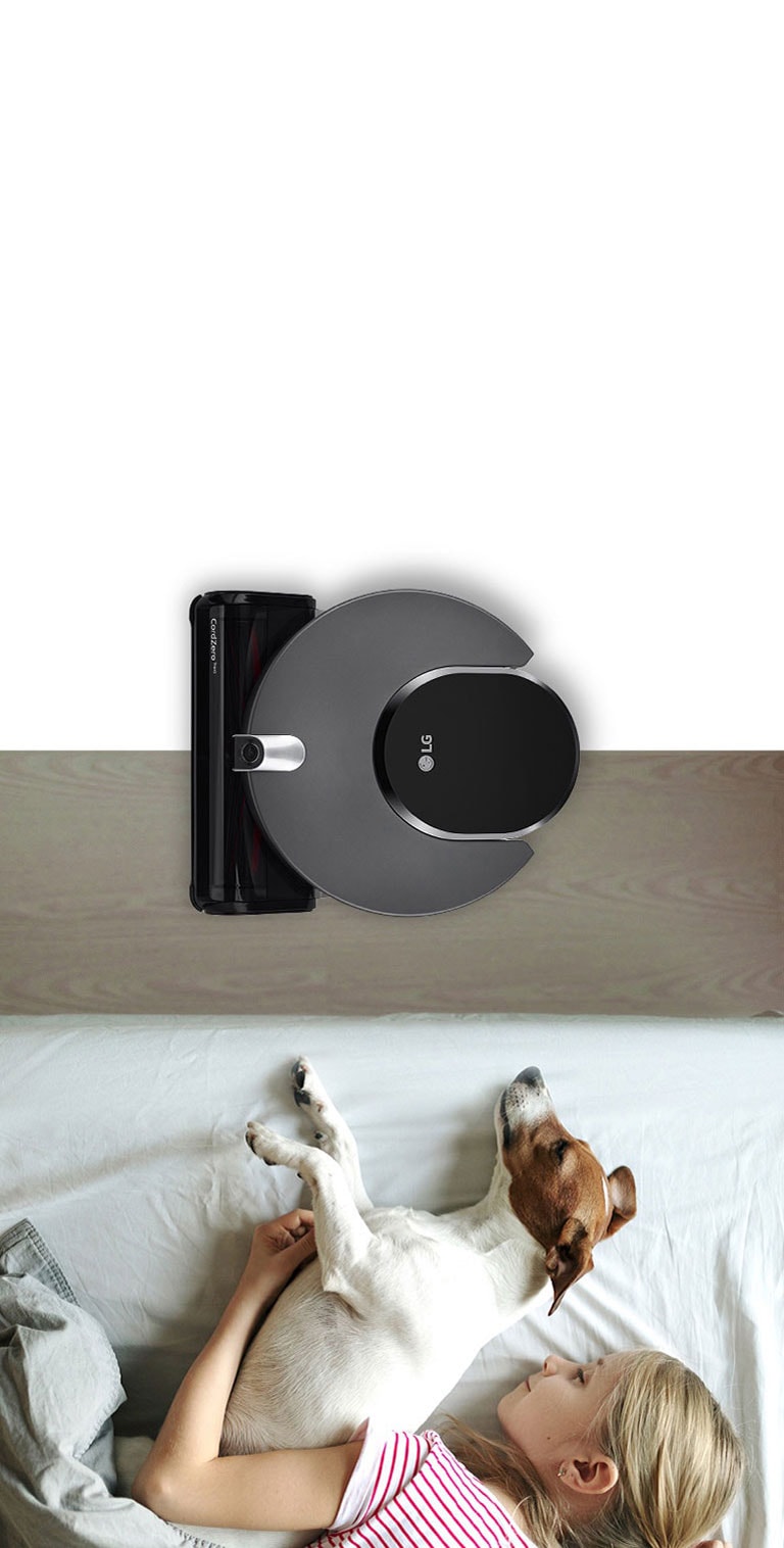 Quiet robot vacuum cleaning next to sleeping child and dog