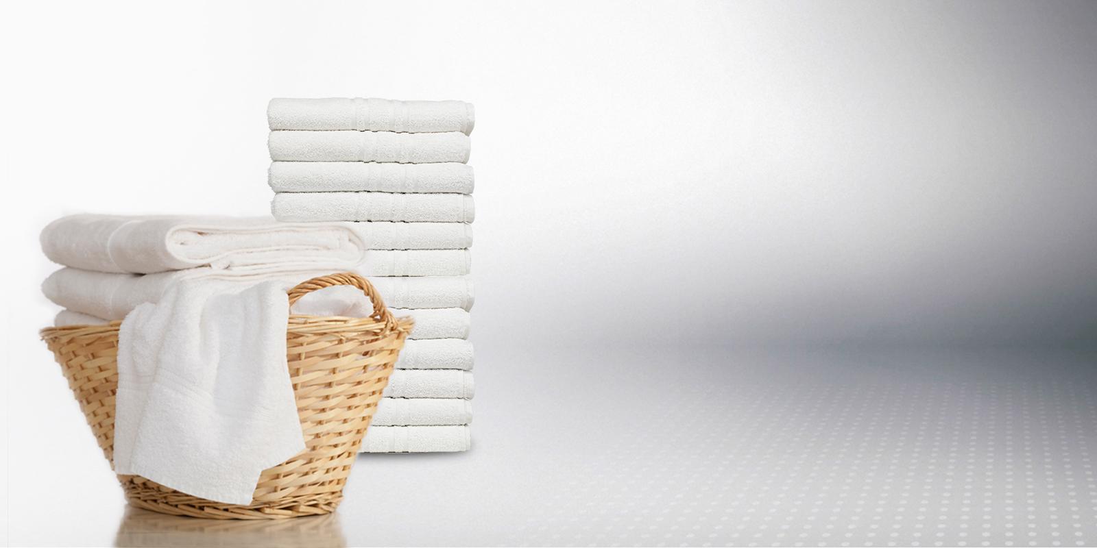 Folded laundered towels showcasing capacity