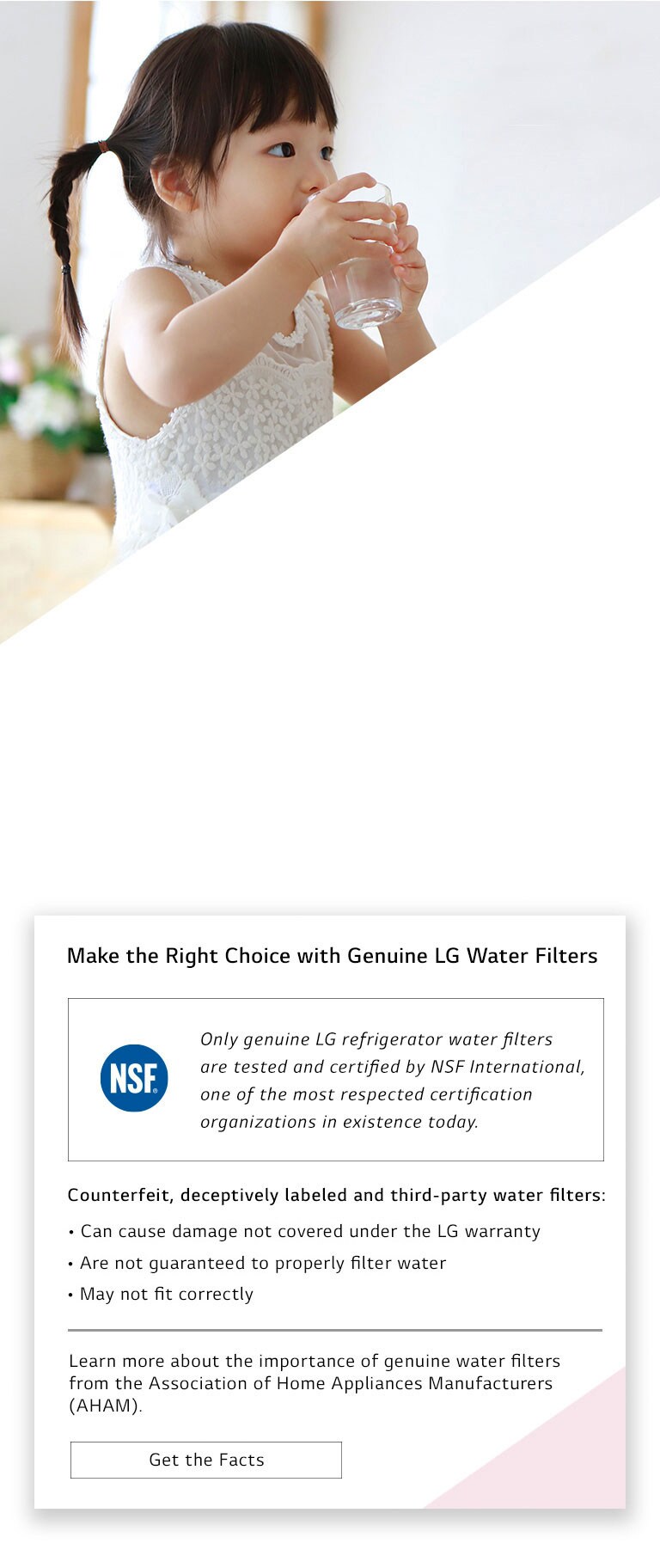 little girl drinking water from a cup