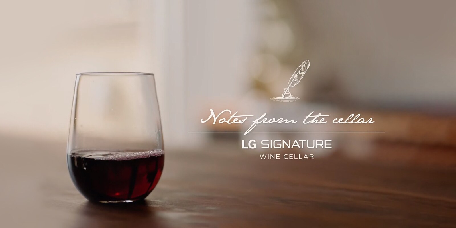 A cup of red wine is placed on the table.