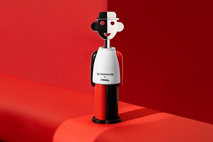 LG SIGNATURE corkscrew by Alessandro Mendini is placed at the top of the red stairs.