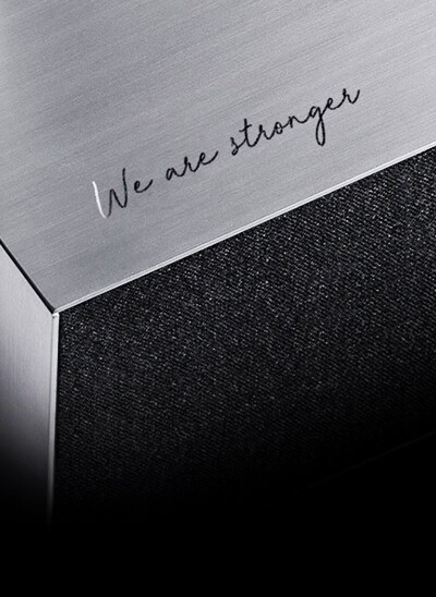 A close up shot of the LG SIGNATURE OLED R casing with the text 'Stronger Together' engraved on it.