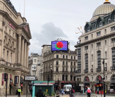 LG SIGNATURE advertisement picture displayed on a billboard on Piccadilly circus street.