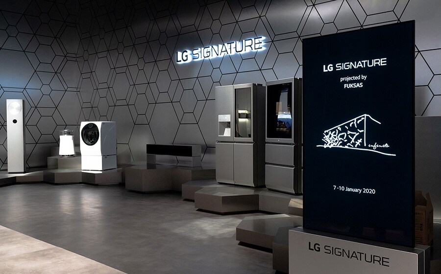 Panel for explaining LG SIGNATURE at CES 2020 is laid on the right side of the picture and some LG SIGNATURE products are laid on the left side.