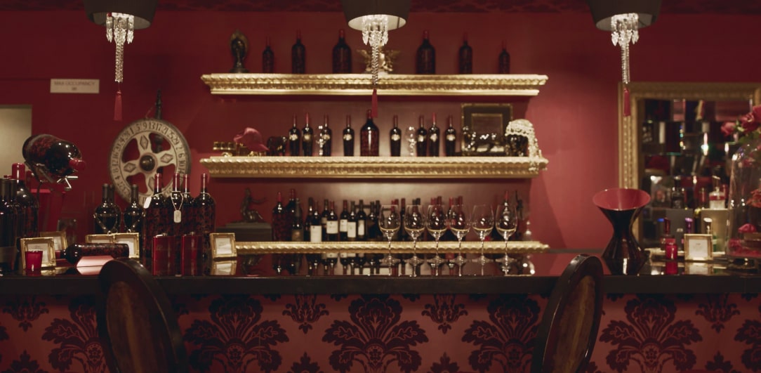 The interior of a grand, luxurious bar.