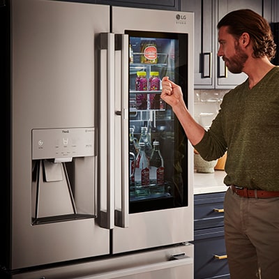 Knock twice to see what’s in your STUDIO fridge with InstaView® Door-in-Door® image