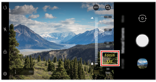 When the focus option is set to Manual Focus, the focus peaking vertical slide bar appears left to the shutter button.