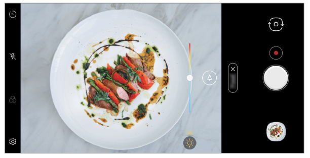 Use the color slide bar located left to the shutter button to adjust the white balance.