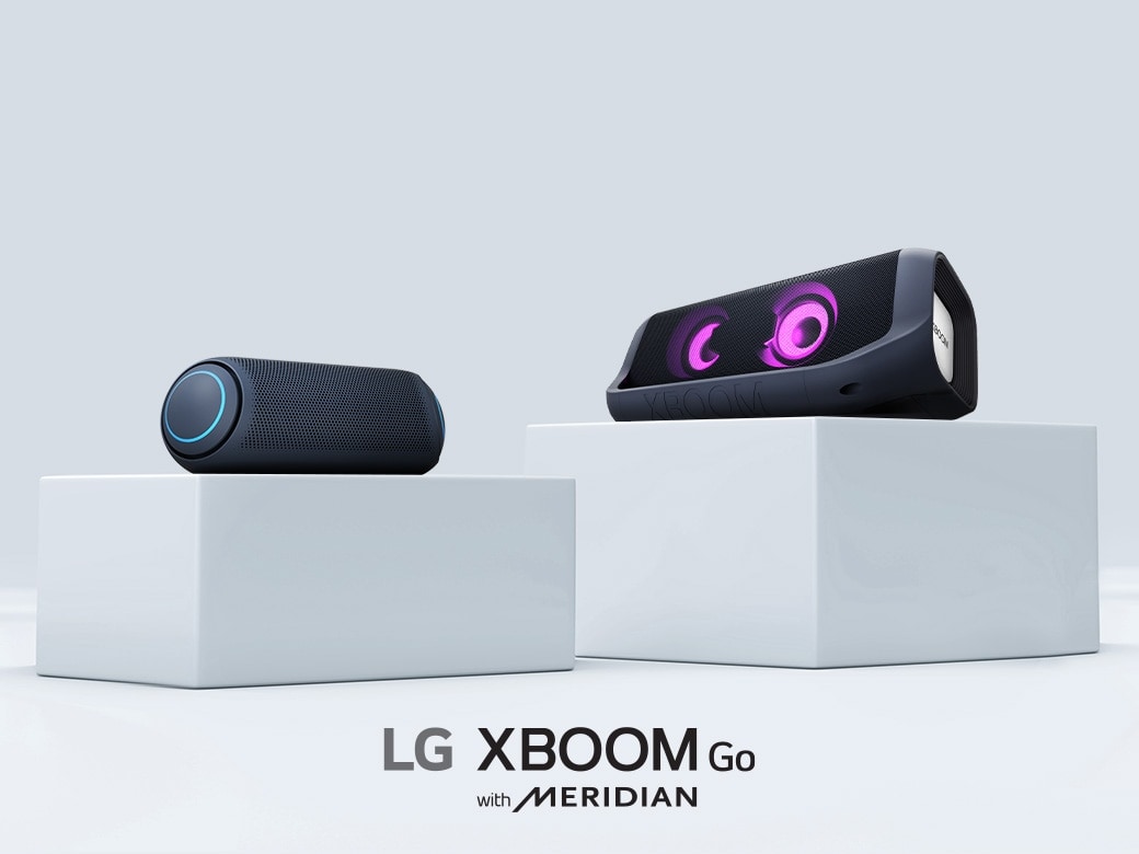 LG XBOOM Go PL7 and PN7 bluetooth speakers are angled towards each other on separate white boxes.