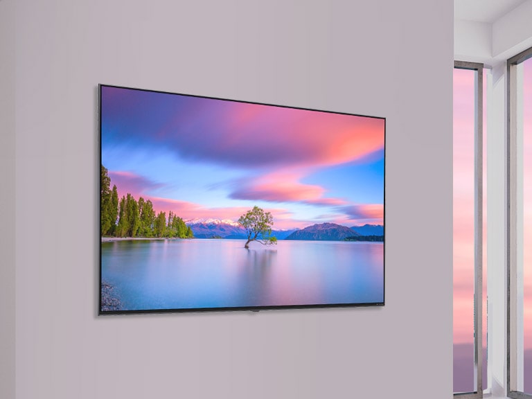 A scene depicting a flat-screen TV mounted on a white wall. As the image scrolls from side to side the image changes from a 55-inch to 86-inch TV.