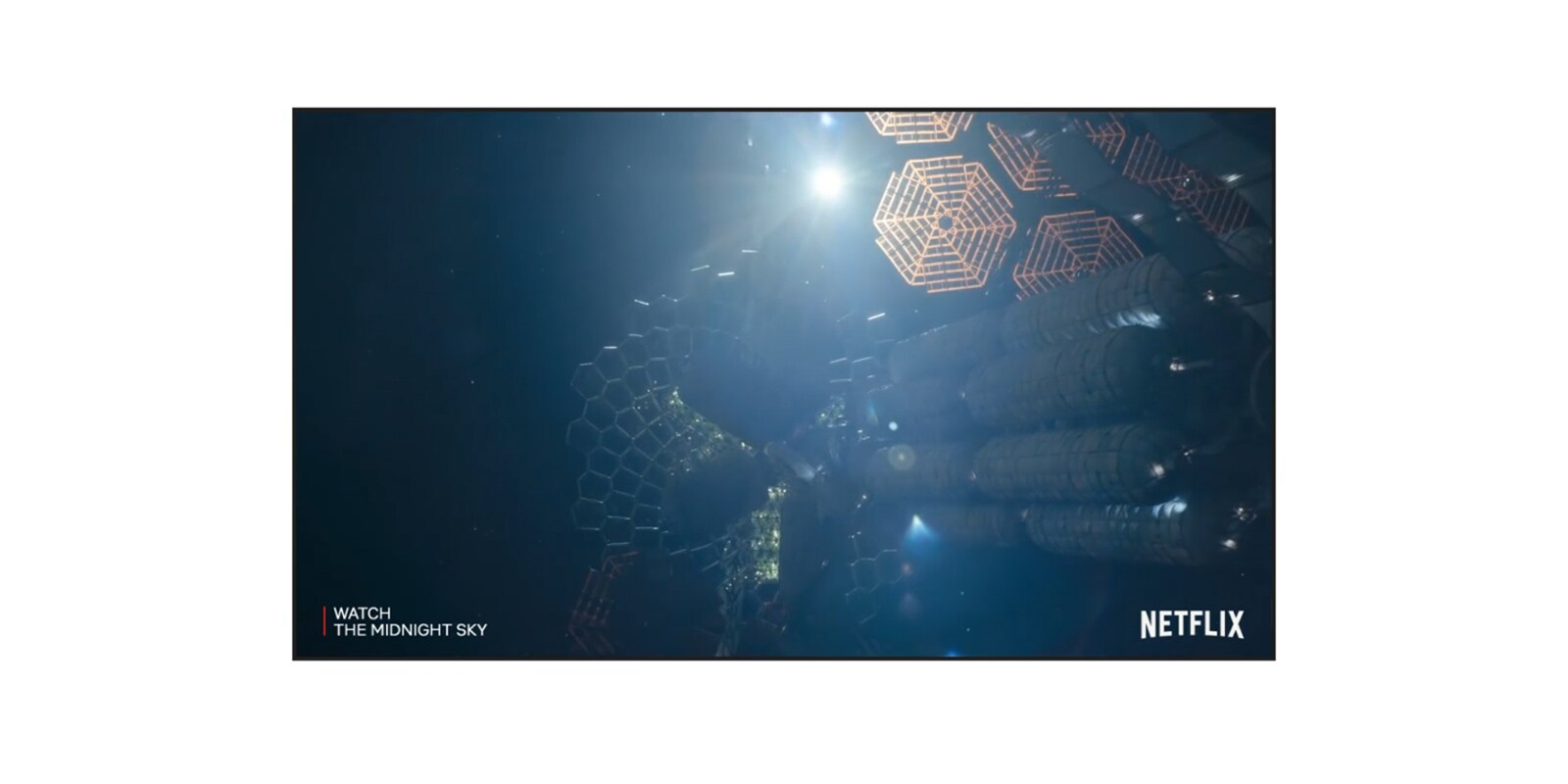 A TV screen showing a trailer of The Midnight Sky on Netflix (play the video).