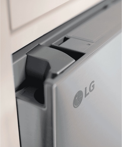 Close-up of the Zero Clearance hinge at the top of the refrigerator door.