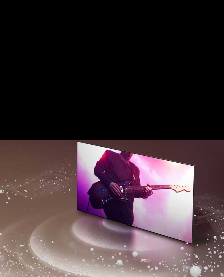 LG TV tovush pufakchalari va to‘lqinlari ekrandan tarqalgan va xonani to‘ldirgan holda tasvirlangan.