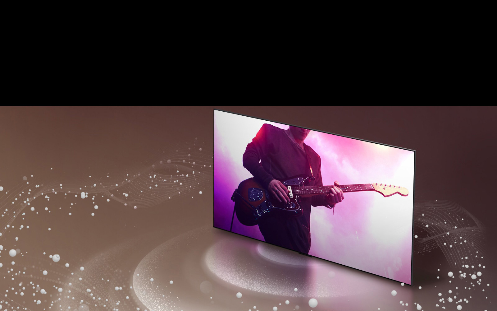 LG TV tovush pufakchalari va to‘lqinlari ekrandan tarqalgan va xonani to‘ldirgan holda tasvirlangan.