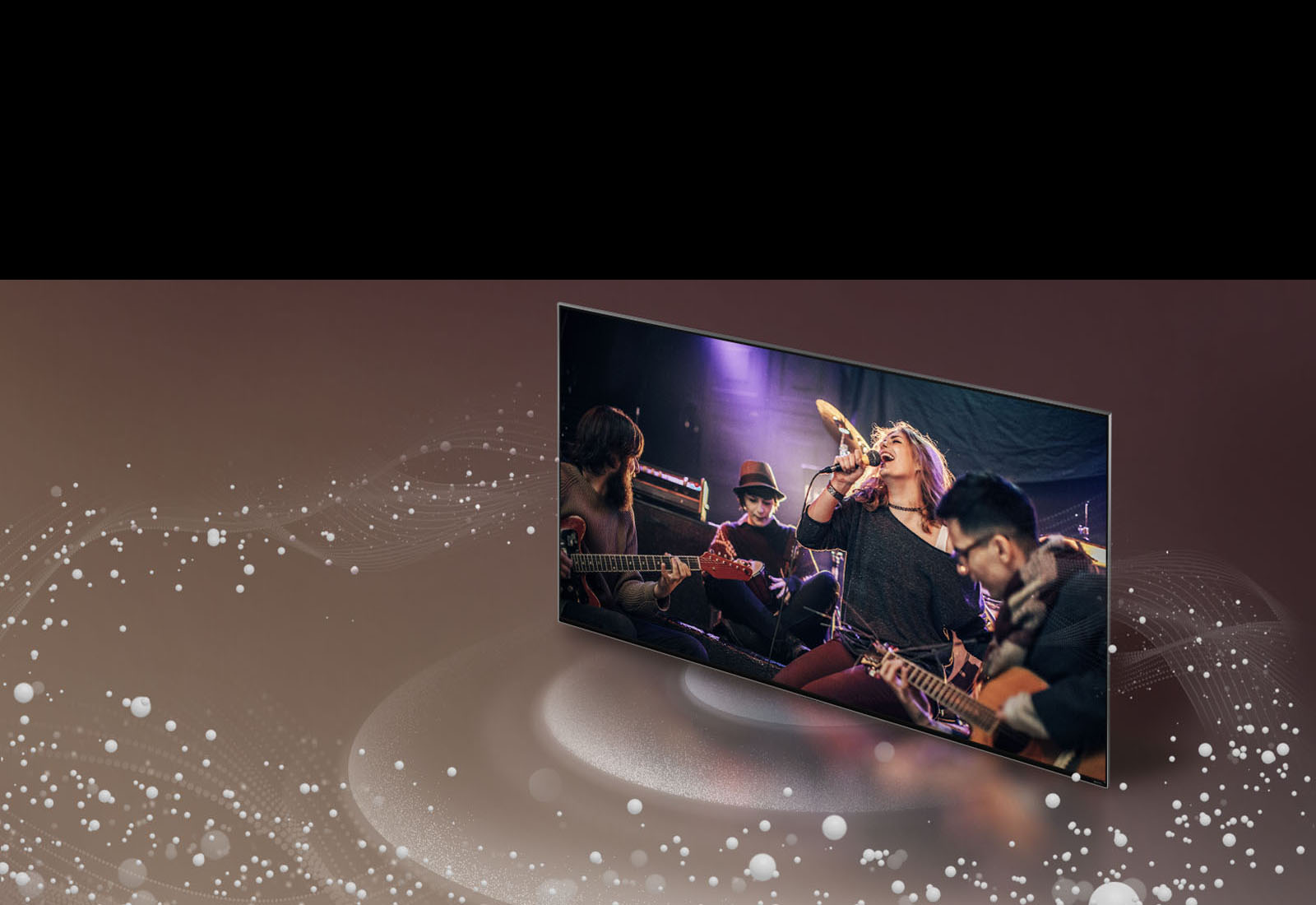 LG TV tovush pufakchalari va to‘lqinlari ekrandan tarqalgan va xonani to‘ldirgan holda tasvirlangan.