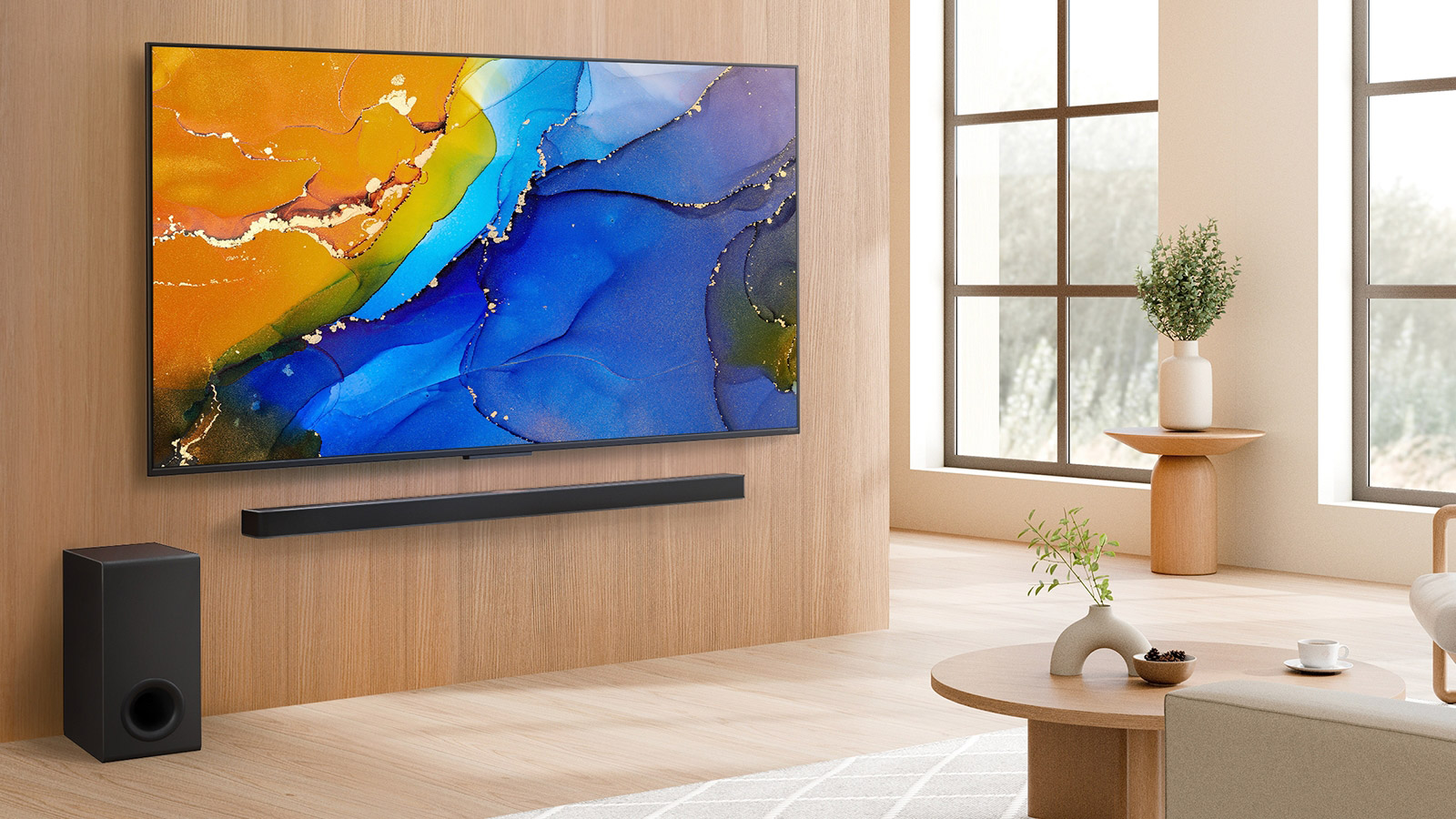 Zamonaviy yashash maydonida LG Soundbar ustidagi devorga o‘rnatilgan LG QNED TV. LG QNED TV rangdor mavxum fonni tasvirlaydi.