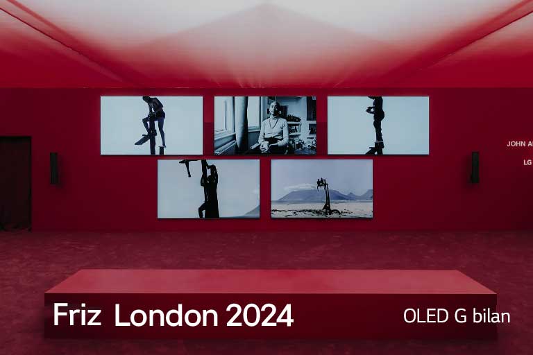 San’at asarlari tasvirlangan bir nechta LG OLED G bilan qizil xona.