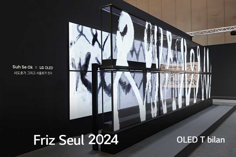 San’at asarlarini tasvirlovchi LG OLED T shaffof ekranlarining yaqindan ko‘rinishi.