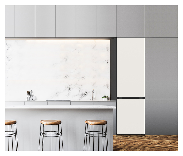 It shows mist beige color LG Bottom Freezer Objet Collection is placed in the kitchen that matches naturally to the furniture around.