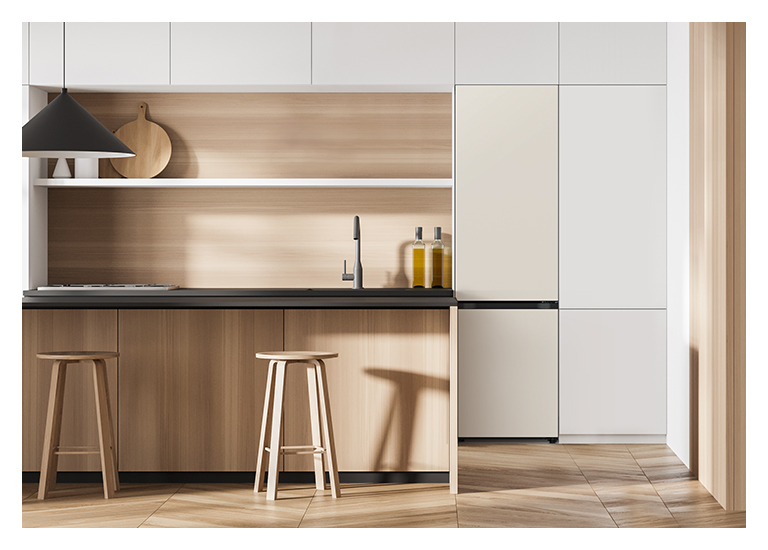 It shows mist beige color Bottom Freezer placed in the kitchen that matches naturally to the furniture around.