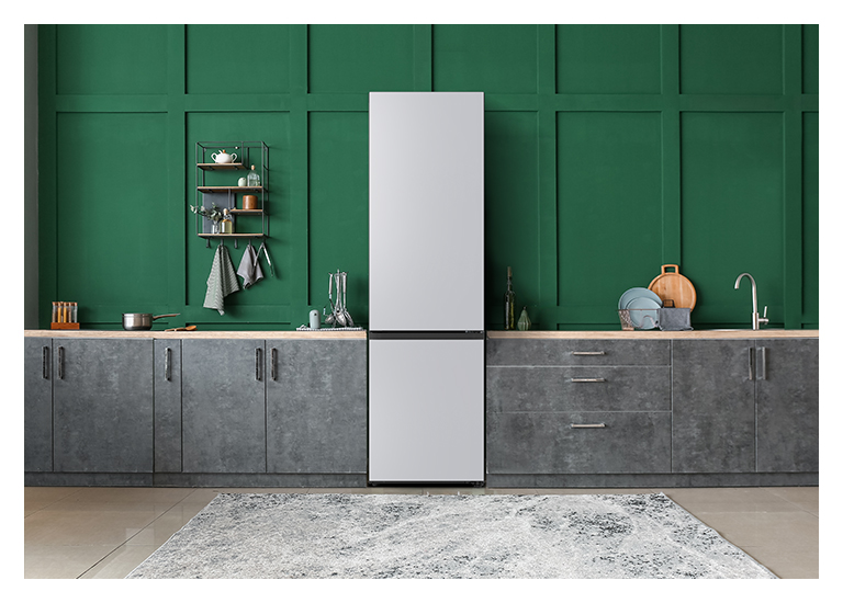 It shows mist silver color Bottom Freezer placed in the kitchen 