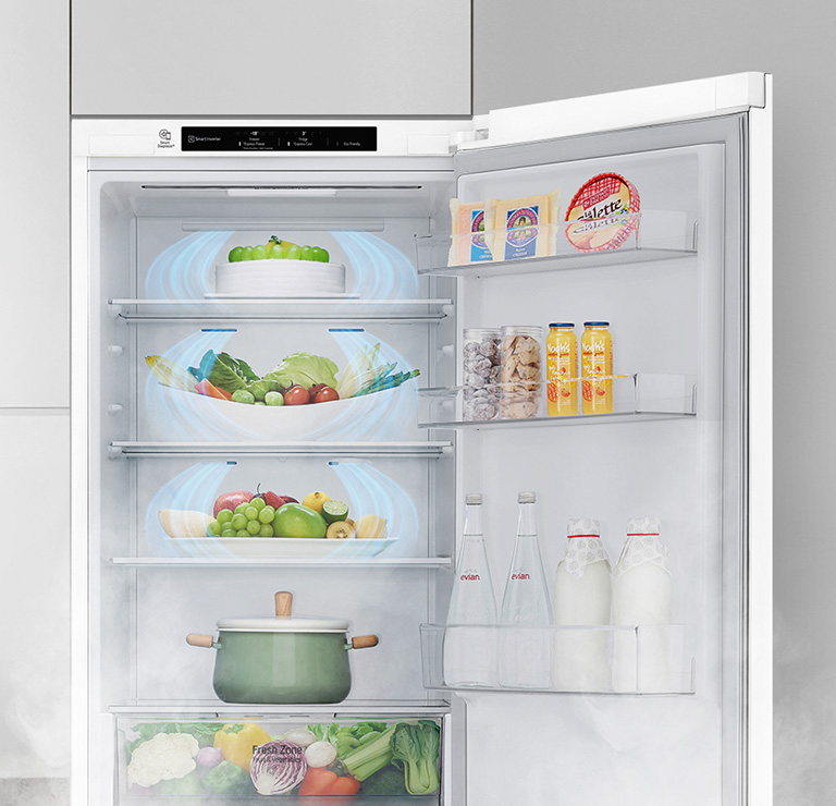 Sovutgichning ustki yarmi eshigi ochiq va ovqat bilan ko'rsatilgan. Havo muzlatgichning yuqoridan pastga o'tib, ichidagi barcha ovqatlarga yetib boradi.