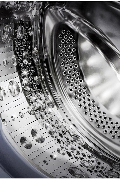 Изображение стиральной машины изнутри, где видны лифтеры из нержавеющей стали.