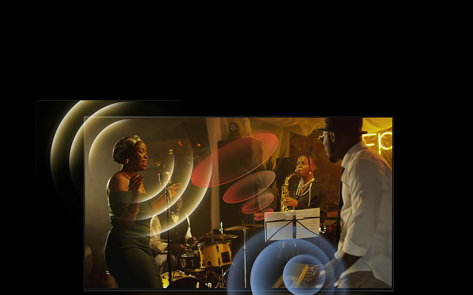 На экране телевизора LG OLED демонстрируется выступление музыкантов с яркой круговой графикой вокруг микрофонов и инструментов.