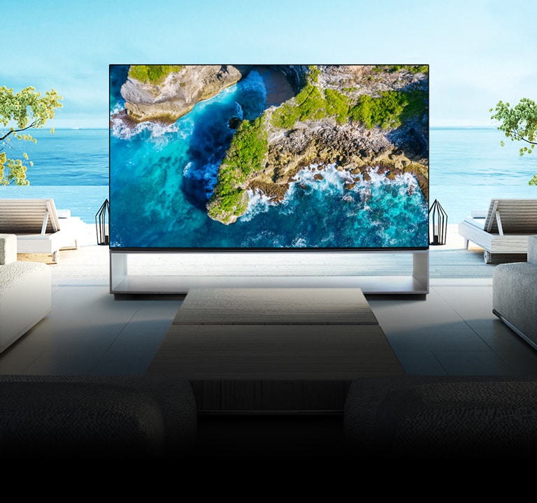 TV showing an aerial view of nature in a luxurious house setting