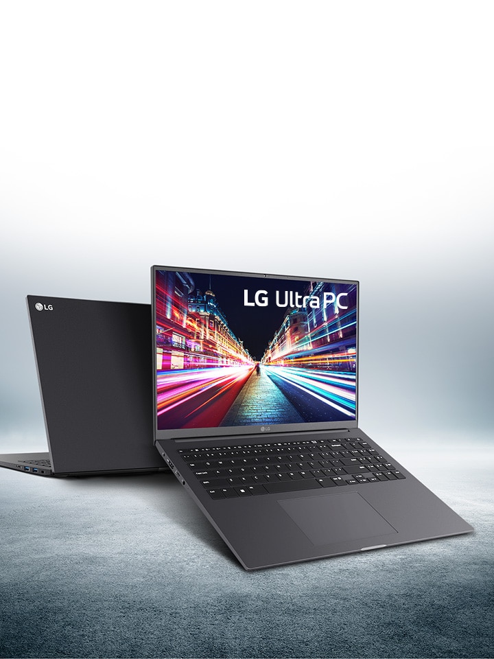 LG Ultra PC laptops displaying a vibrant cityscape on the screen, with sleek black design.