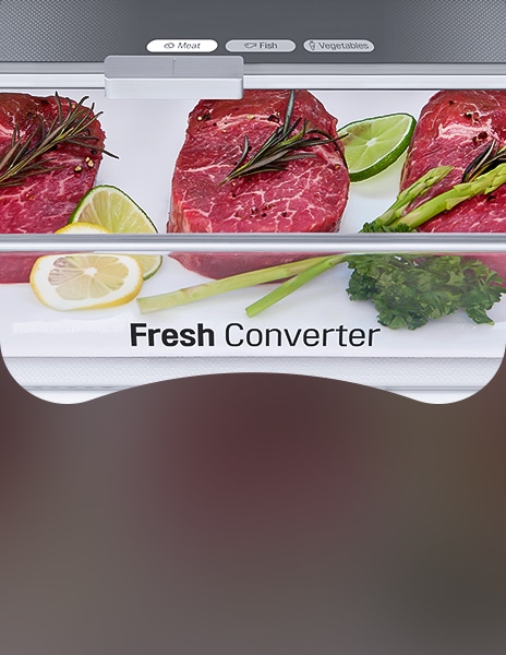 LG fridge freezer Fresh Converter drawer storing meat with herbs lemon and vegetables