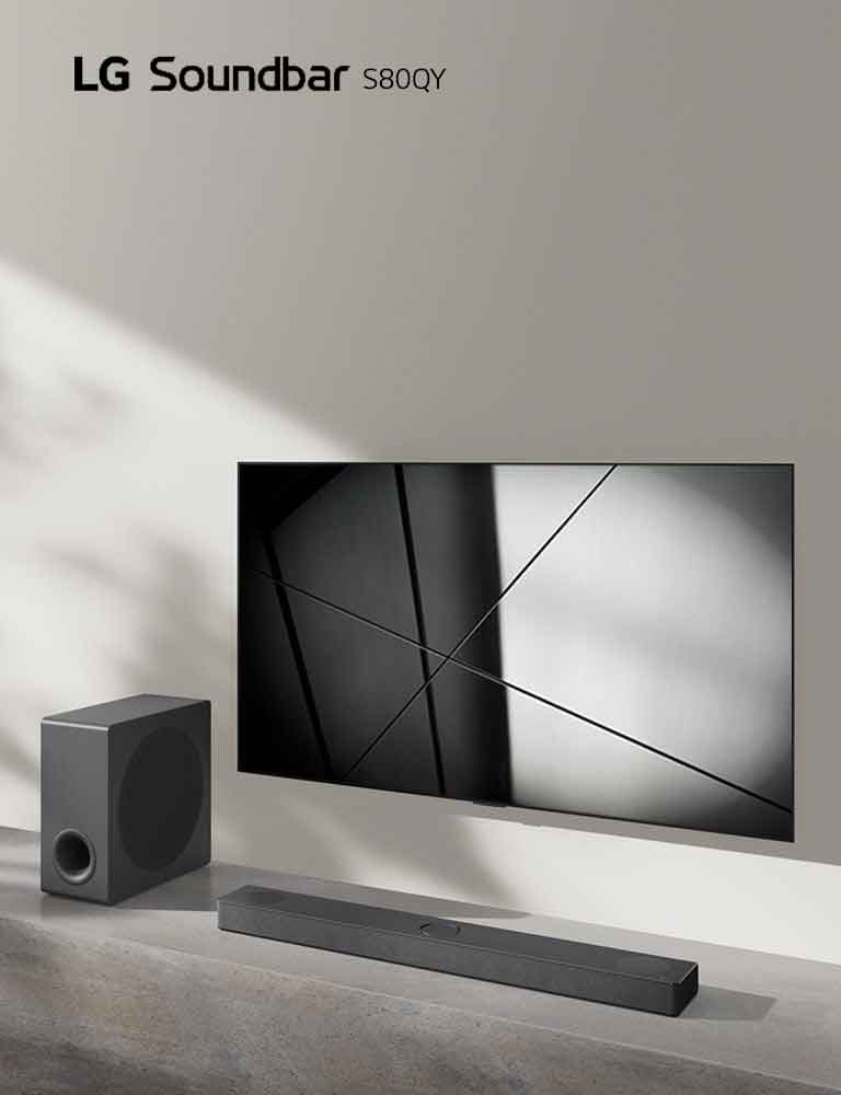 LG sound bar S80QY and LG TV are placed together in the living room. The TV is on, displaying a black and white image.