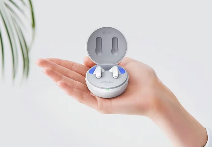 A pair of earbuds in a UVnano charging case.