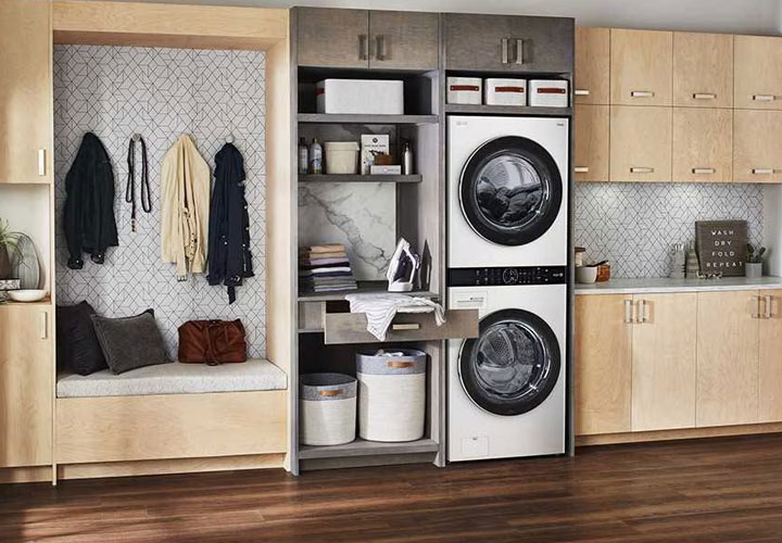 A laundry room equipped with an LG washing machine and dryer