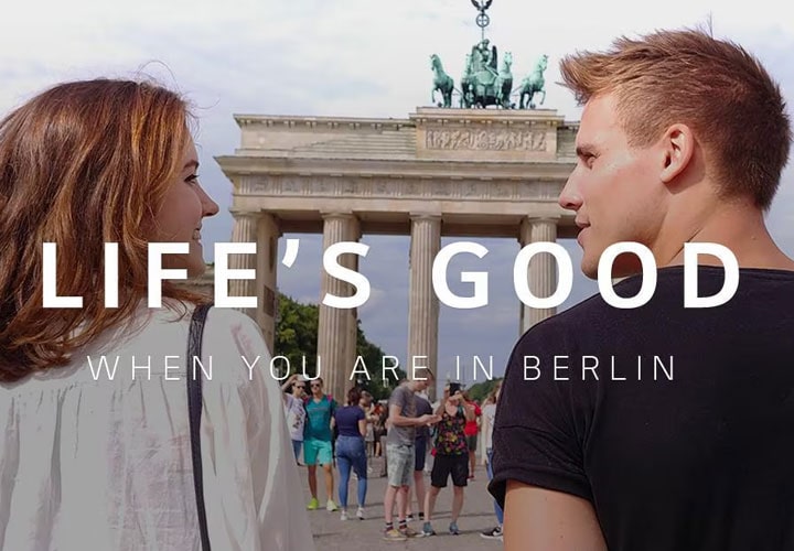 A snap-shot of two people enjoying a walk at Brandenburg Tor from the life is good video taken by lg v30
