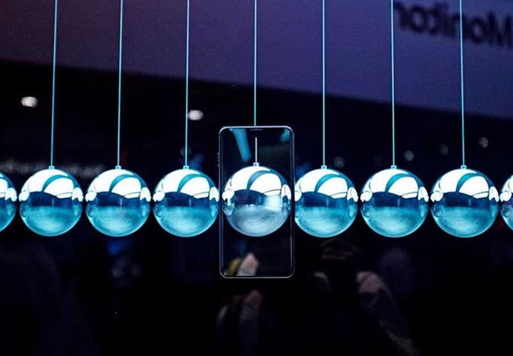 LG V30 smartphone which looks transparent a silver ball.