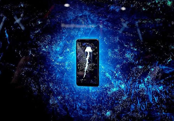 LG V30 smartphone on the geometrical image.