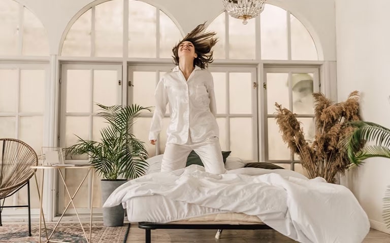 4. Dust off the drapes and bedding with your smart washing machine