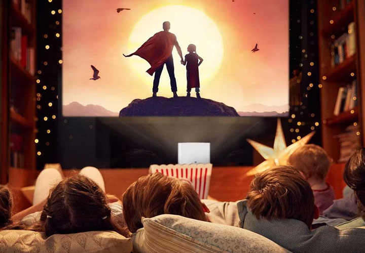 A family enjoys their home cinema room.