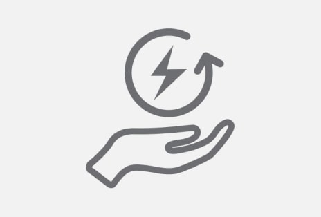 Illustration of a lightning symbol enclosed within a circular arrow, supported by a hand to represent energy efficiency and sustainable operation.