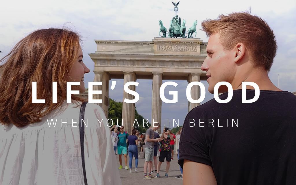 A snap-shot of two people enjoying a walk at Brandenburg Tor from the life is good video taken by lg v30
