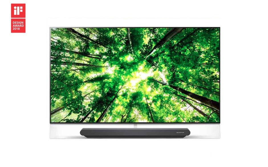 LG SIGNATURE OLED G8 TV with soundbar on white background with iF design award in corner