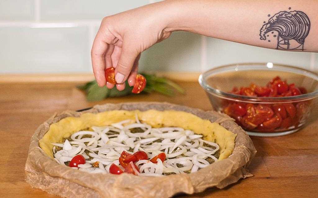 LG's chef adds tomato to the Tomato Quiche - and it's all set to put into the NeoChef microwave | More at LG MAGAZINE